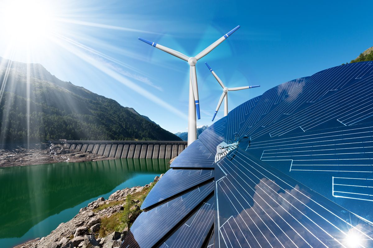 Una diga per l'energia idroelettrica, le turbine eoliche e i pannelli solari